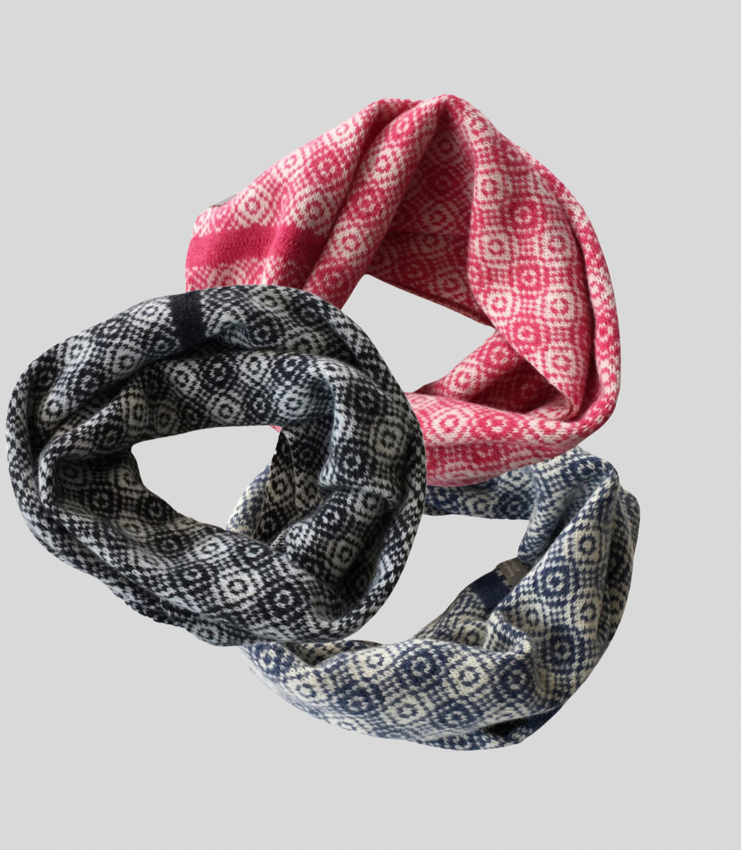 Soft British spun merino lambswool beautifully knitted circle scarf, wear it and share it. Lovely present to give or have. This very practical circle scarf worn wrapped around twice for a cosy, warm feel or let it hang loosely around your neck. Great accessory for the cyclist or all family to share.