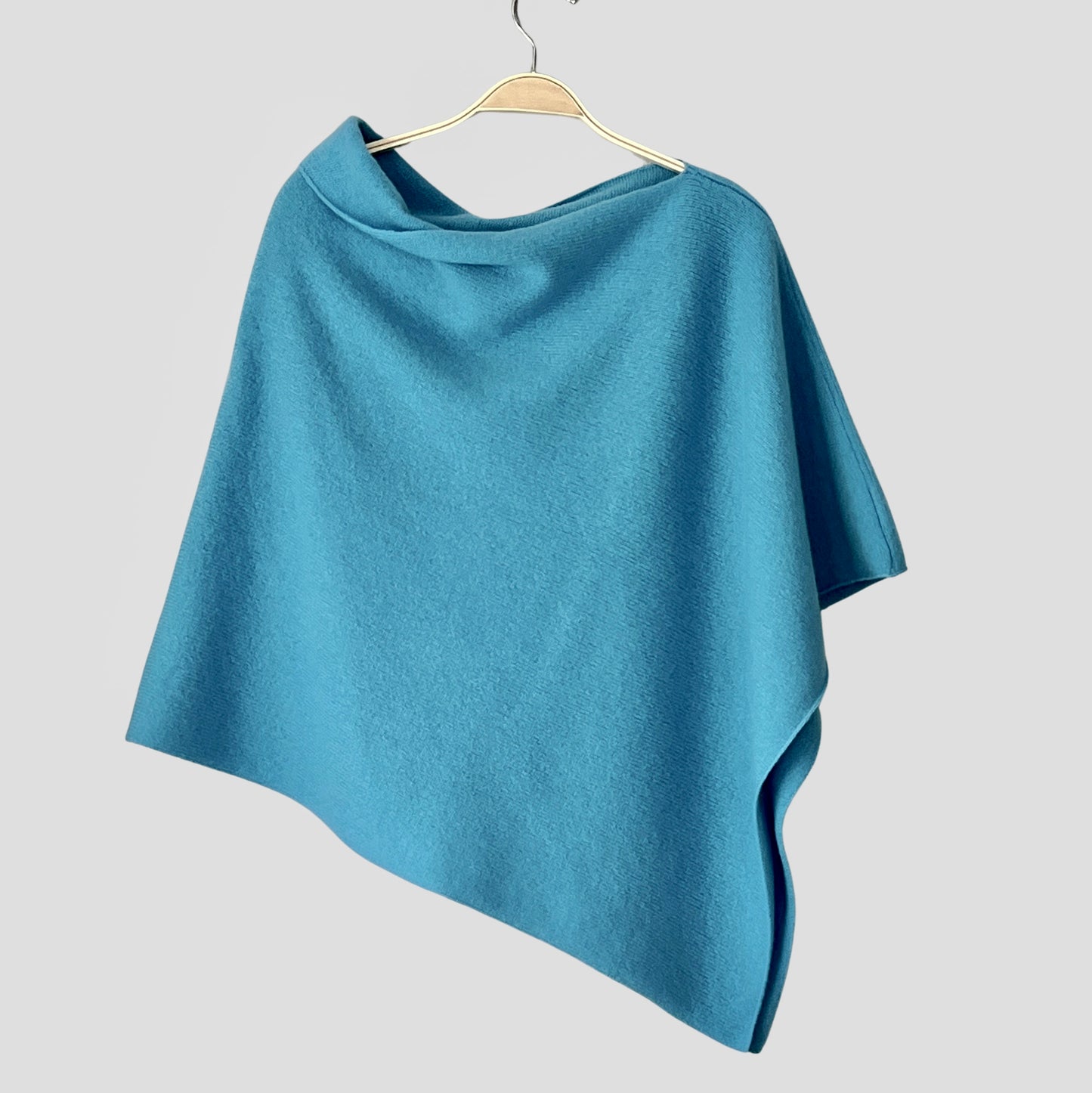 Poncho turquoise blue merino lambswool